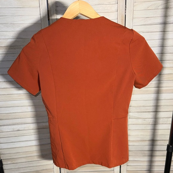 Figs Women's Button Down Shirt in Warm Orange - Picture 2 of 3